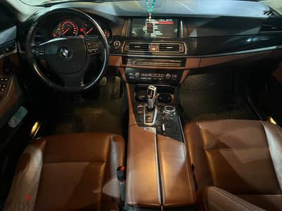 BMW 520i بحالة الزيرو فابريكا بالكامل 2014 14